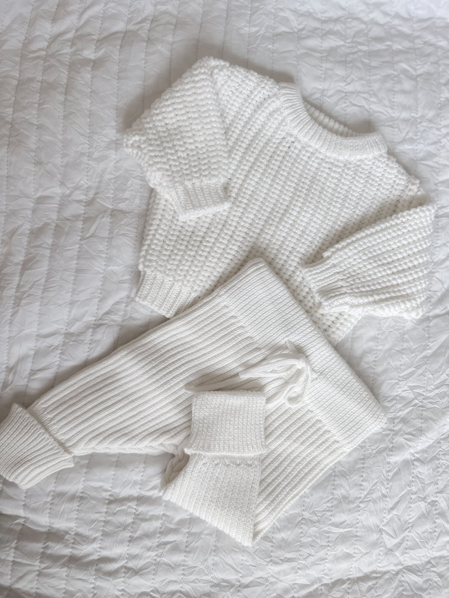 White knitted jumper