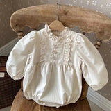 Baby and Toddler cream romper with embroidered and frill detail